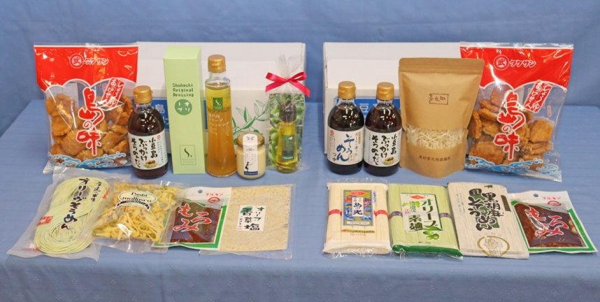 お中元用に販売されている「小豆島オリーブセット」（左）と「小豆島そうめんセット」